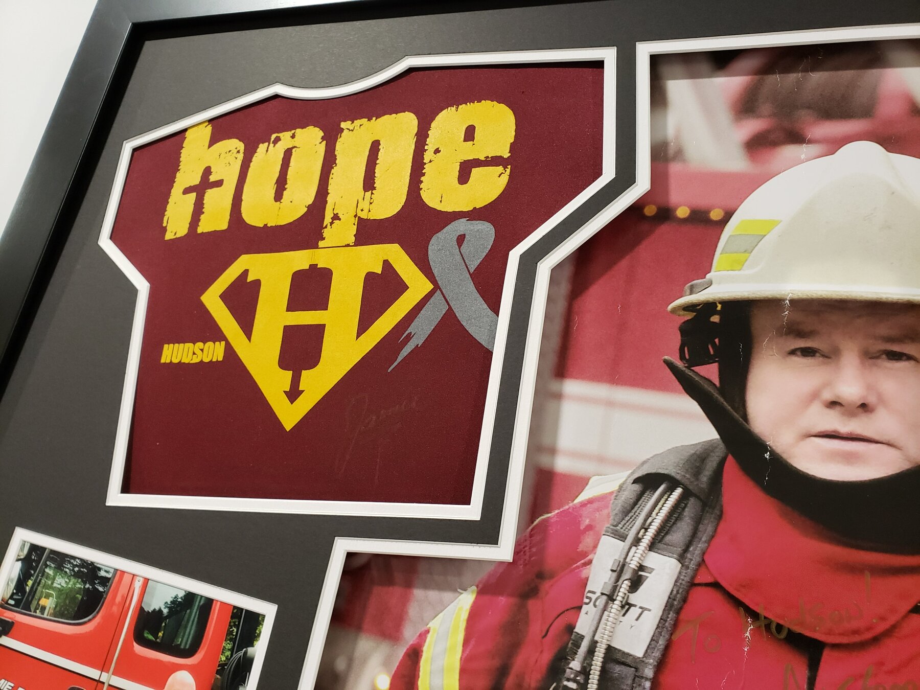 Full project view of firefighter career tribute custom framing project