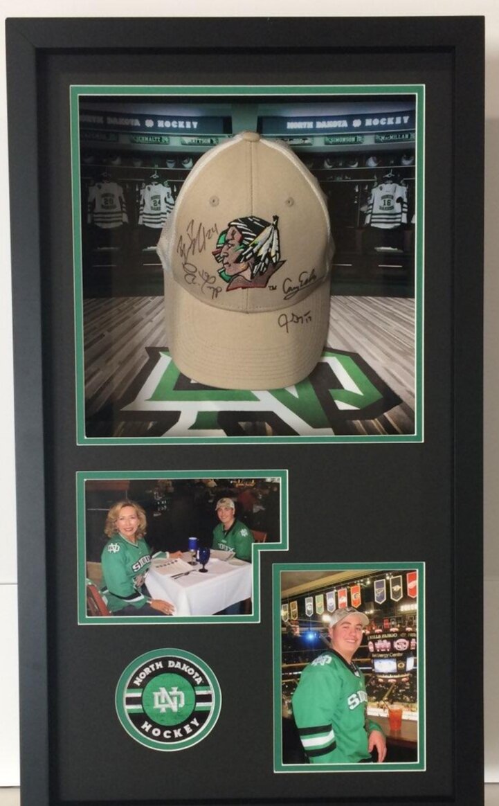 Full project view of golf memorabilia cap shadowbox custom framing project