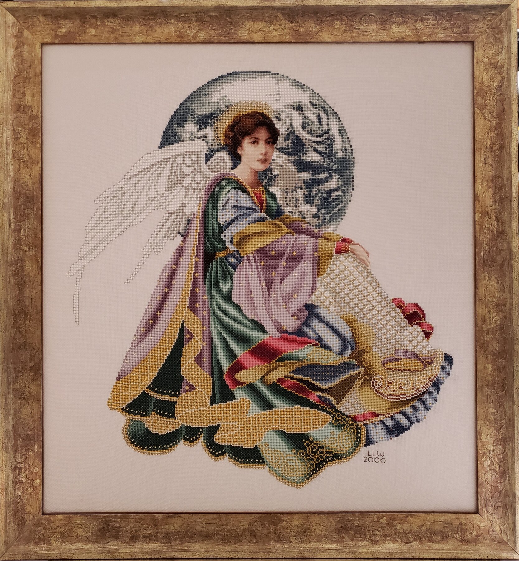 Full project view of needlework art presentation custom framing project