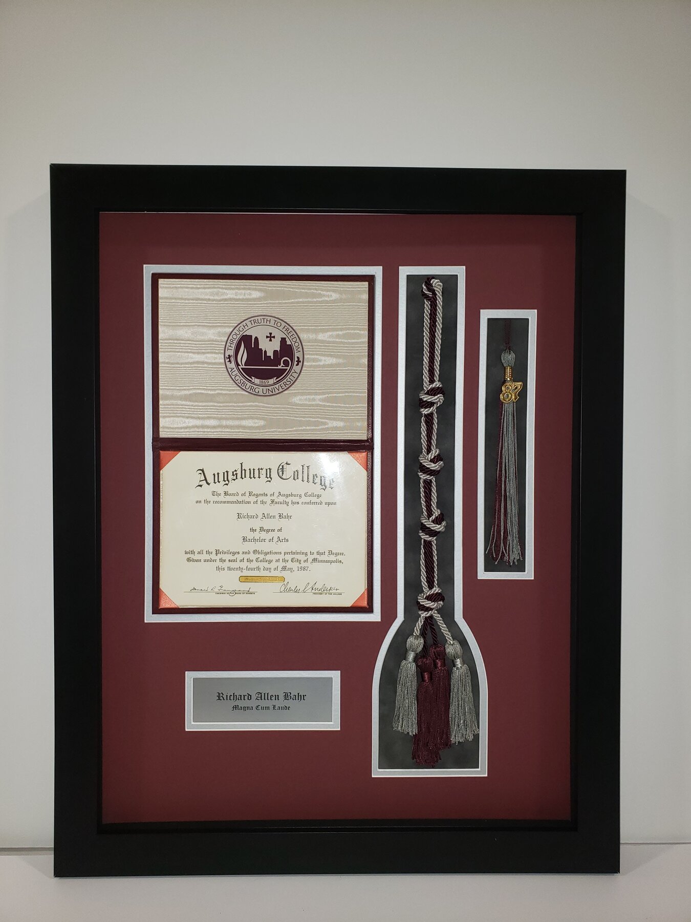 Full project view of professional achievement display custom framing project