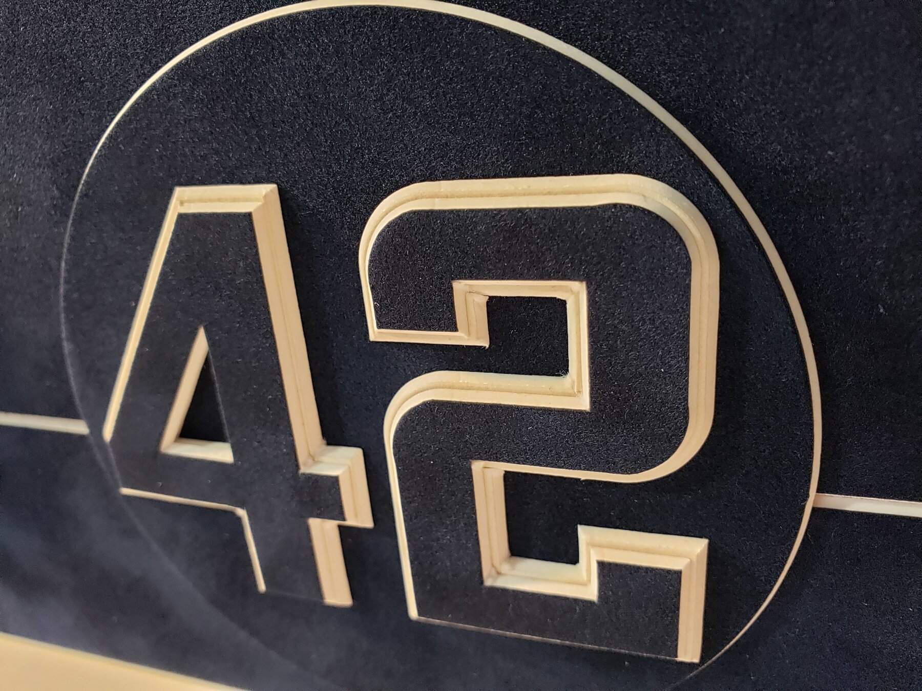 Full project view of jackie robinson number 42 detail custom framing project