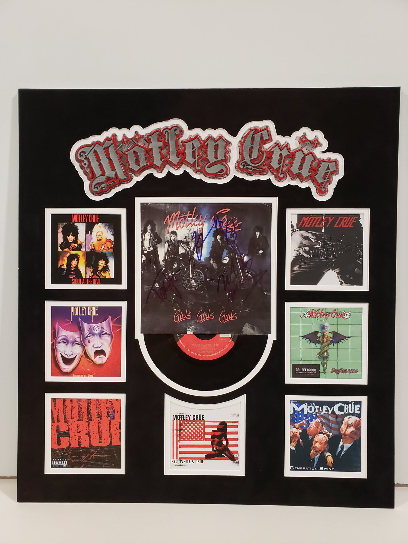 Full project view of mötley crüe retrospective custom music memorabilia framing