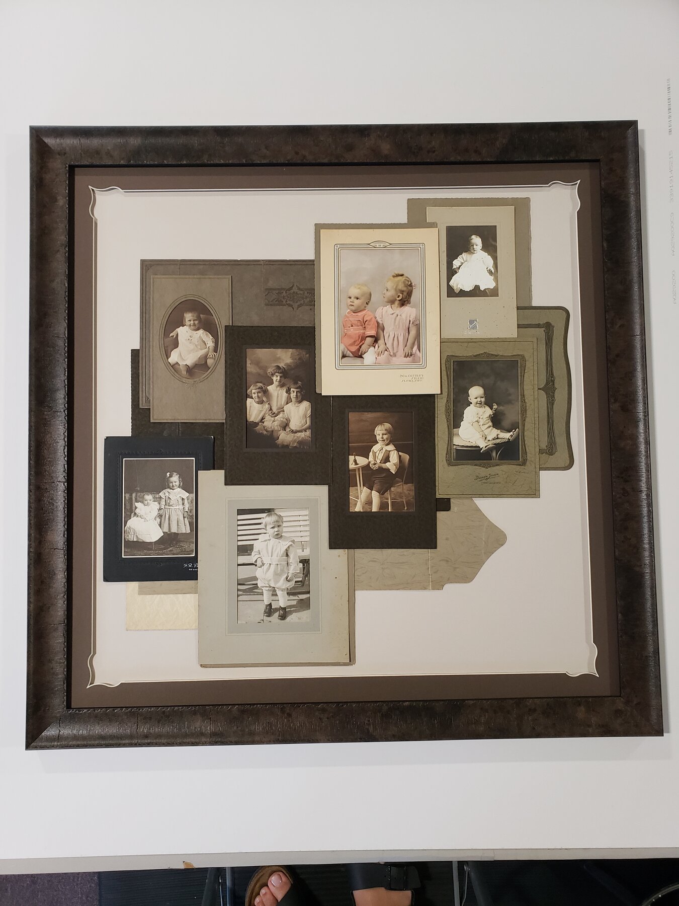 Full project view of vintage family photo collage custom framing project