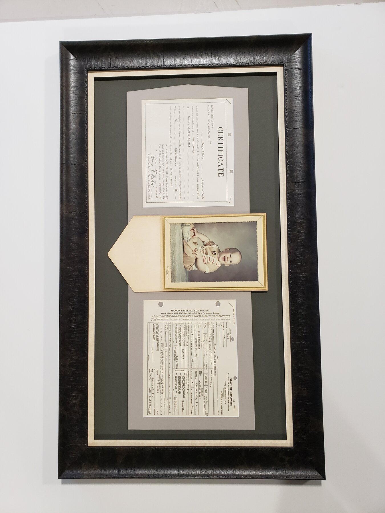 Full project view of family history and document frames custom framing project