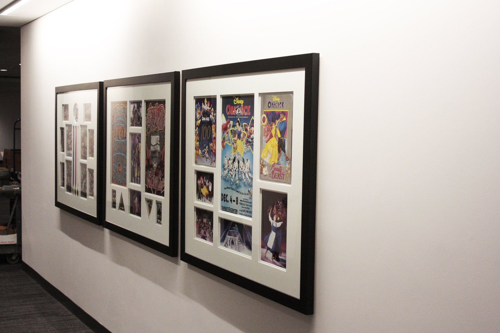 Target Center hallway installation featuring custom-framed event and venue history displays