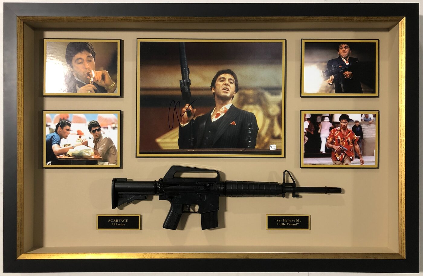 Completed Scarface-themed custom shadowbox with film photographs, signed centerpiece, dimensional nameplates and replica display prop